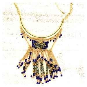 Gold statement necklace with blue details